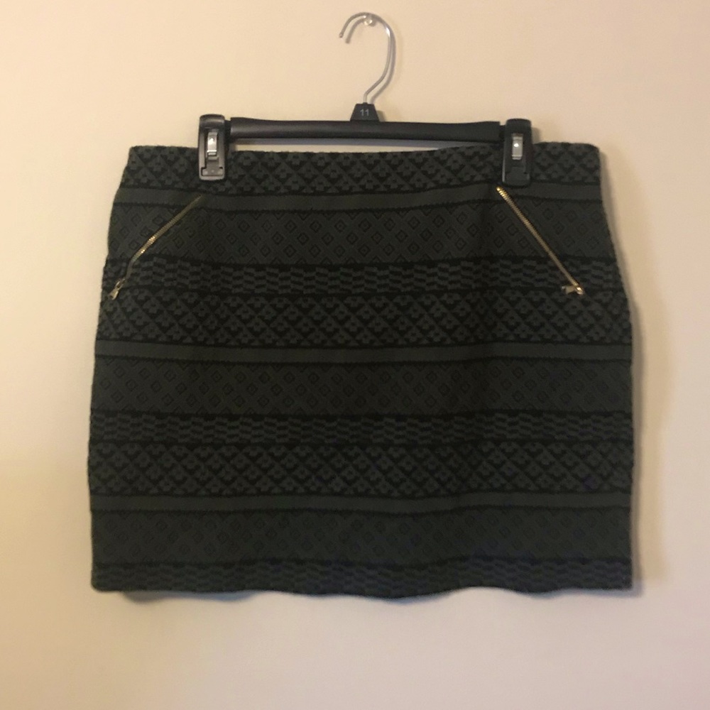 Green and black patterned skirt